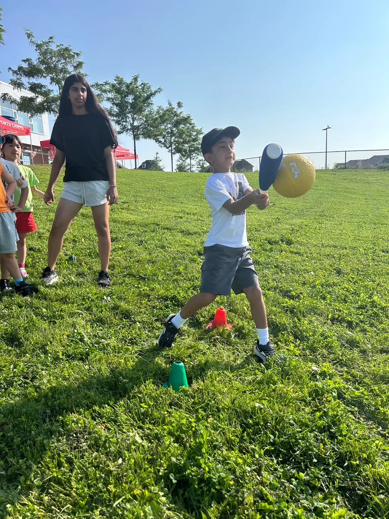 A deer camper makes contact with a large modified ball during a deer period at Rouge Camps.